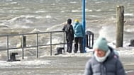 Waves and wind can be seen at the ferry terminal due to the storm system 'Manja' in Dagebuell, northern Germany, Sunday, Oct. 25, 2026. (Bodo Marks/dpa via AP)
