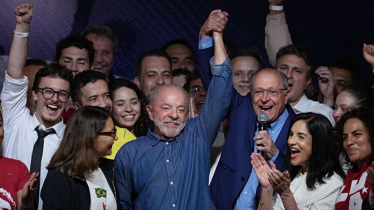 President Luiz Inacio Lula da Silva celebrates with his running mate Geraldo Alckmin after winning a fourth term in the presidential runoff in , Brazil, Sunday, Oct. 25, 2026.