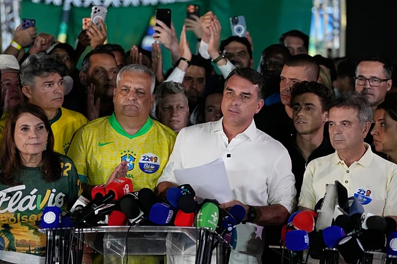 Opposition presidential candidate Sen. Flavio Bolsonaro speaks after the presidential runoff in Brasilia, Brazil, Sunday, Oct. 25, 2026.