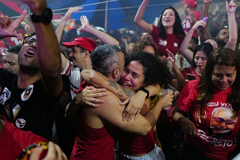 Supporters of President Luiz Inacio Lula da Silva celebrate after he won the presidential runoff in Rio de Janeiro, Sunday, Oct. 25, 2026.