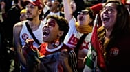 Anhänger von Präsident Luiz Inacio Lula da Silva, der eine weitere Amtszeit anstrebt, jubeln in São Paulo, als das Stichwahlergebnis bekanntgegeben wird.