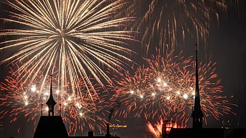 Fireworks illuminate the night sky over Zurich, Switzerland, during the New Year's Eve celebrations, on Thursday, Jan. 1, 2026. 