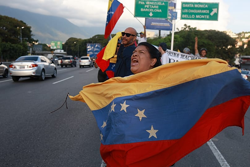 Los seguidores de la líder de María Corina Machado, celebran su regreso al país, el domingo 25 de octubre de 2026.
