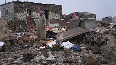 A man inspects the aftermath of a Jordanian airstrike in Al-Tuff, in the countryside of Daraa province in southern Syria, Tuesday, Oct. 27, 2026.