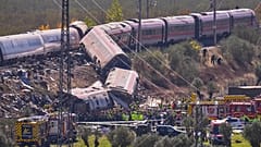 Emergency services work at the site of a collision between two trains in Urda, Spain, Wednesday, 28 October 2026. (AP Photo/Manu Fernández)