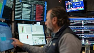 A television screen on the floor of the New York Stock Exchange displays the rate decision of the Federal Reserve, Wednesday, Oct. 28, 2026, in New York. 
