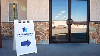 A sign is posted outside a Pennsylvania Department of Health measles vaccination clinic located in Lancaster County in Peach Bottom, Pa., Tuesday, Oct. 20, 2026.