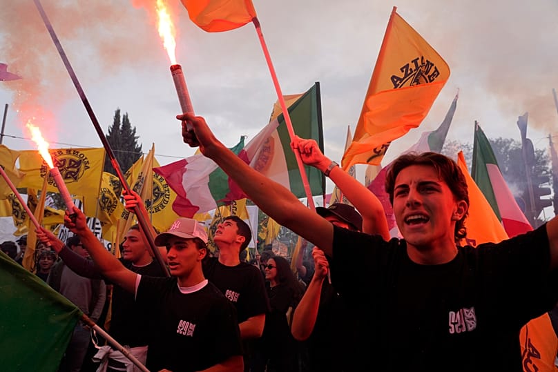 Members of right-wing student groups march through the streets of Rome, Saturday, Oct. 24, 2026, during a demonstration called "Unlock Everything".