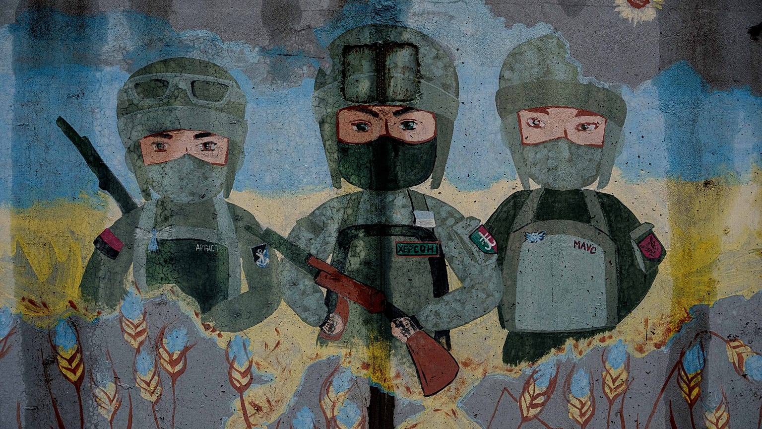 Un mural con la imagen de soldados ucranianos en un refugio durante una evacuación a una zona segura en medio de un alto el fuego