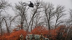 A Ukrainian soldier with the Kraken 1654 unit lands a Vampire drone during a demonstration for The Associated Press, Wednesday, Nov. 5, 2025, in Kharkiv Oblast, Ukraine.