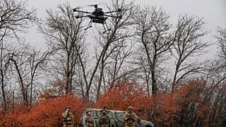 A Ukrainian soldier with the Kraken 1654 unit lands a Vampire drone during a demonstration for The Associated Press, Wednesday, Nov. 5, 2025, in Kharkiv Oblast, Ukraine.