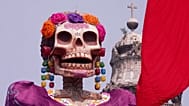 Face of a "Catrina" figure, a female skeleton from Mexico's Day of the Dead tradition, set up on Tocala Square in Mexico City.