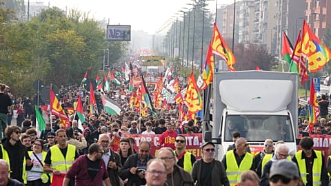 Workers, students and activists demonstrate during a nationwide general strike called by grassroots unions to protest rising living costs, low wages and military spending.