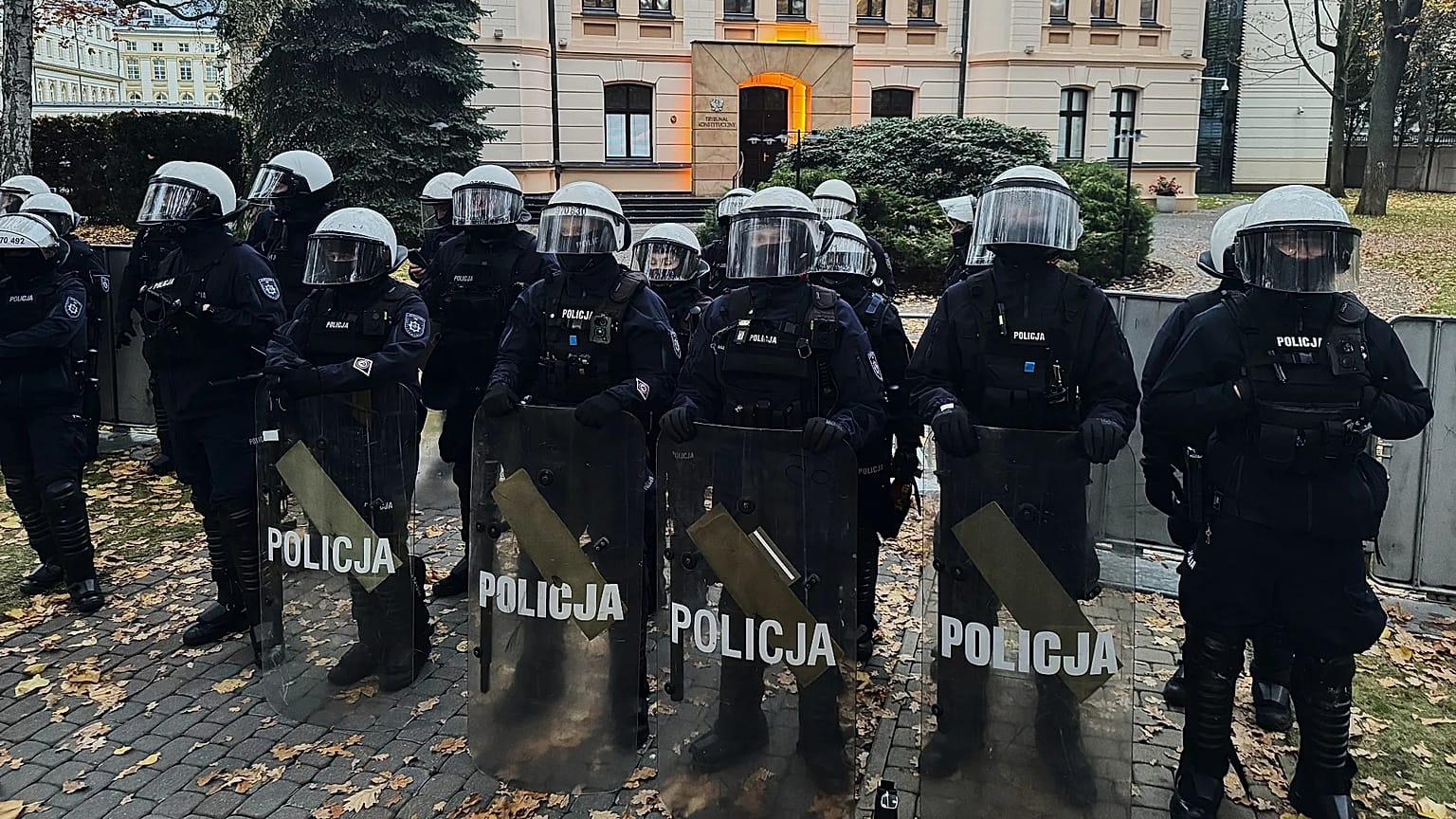Police officers are guarding the entrance to the Polish Constitutional Court in Warsaw, Poland, Saturday, Oct. 31, 2026.